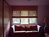 Woven wood shade in den - after - East Hampton, NY